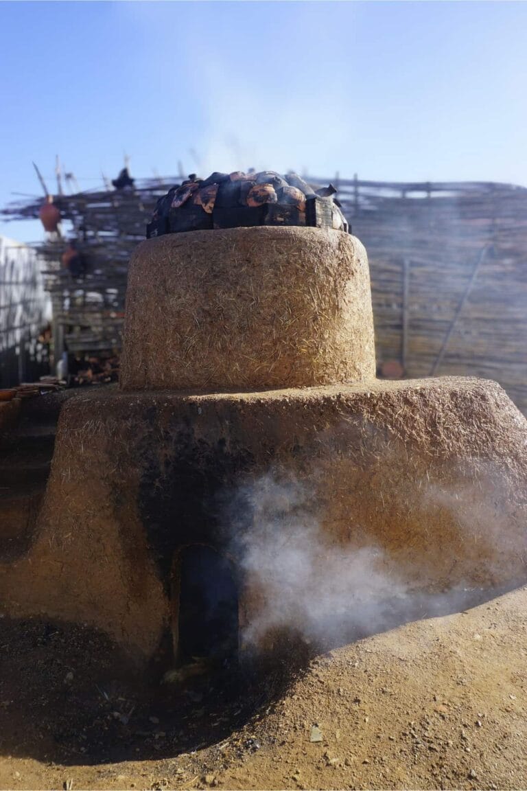 Traditional outdoor earth kiln used for firing handmade pottery in the Rif Mountains.